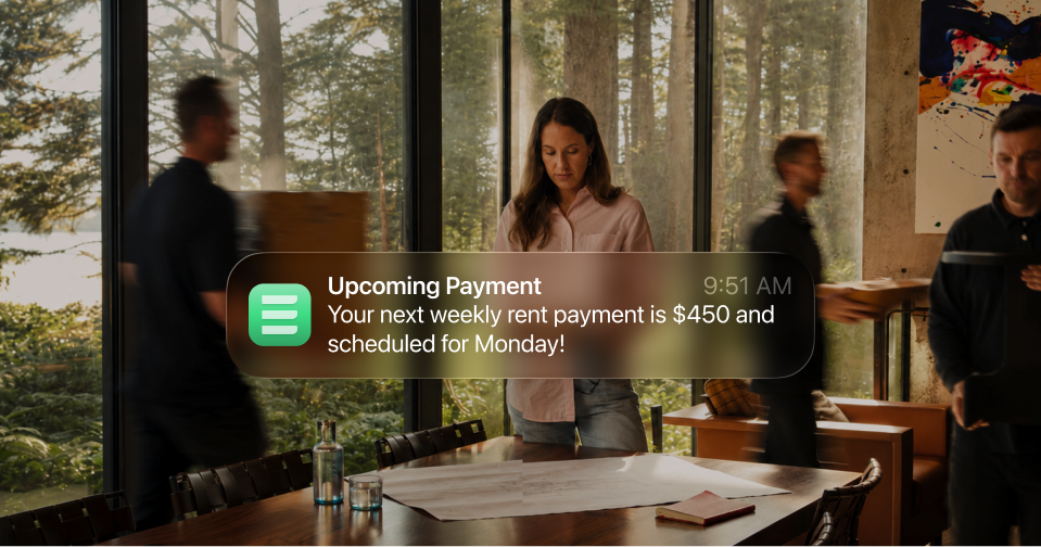 Upcoming rent payment notification over a rental planning table.