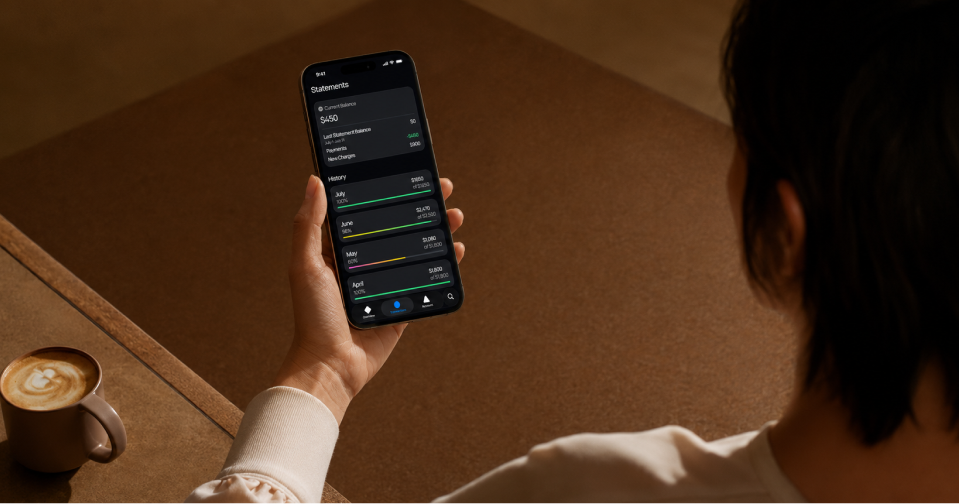 Renter reviewing Spread statement history on a phone.