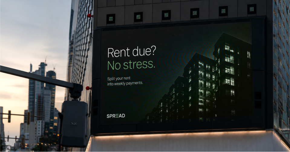 Large city billboard reading Rent due? No stress.