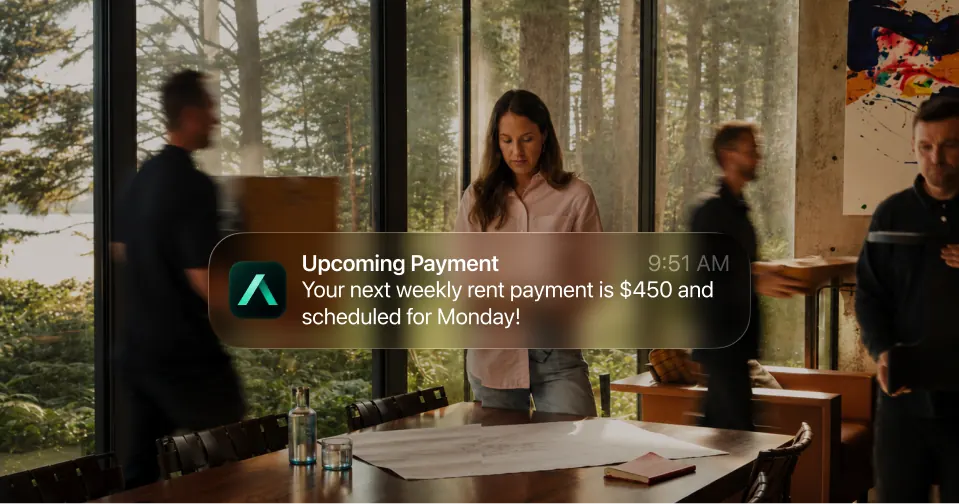 Upcoming rent payment notification over a rental planning table.