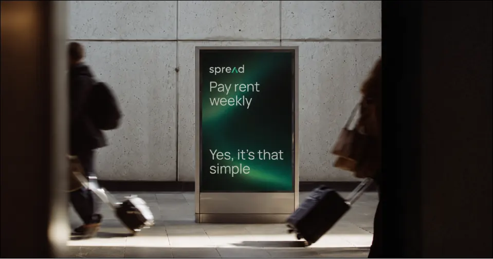 Transit ad reading Pay rent weekly.